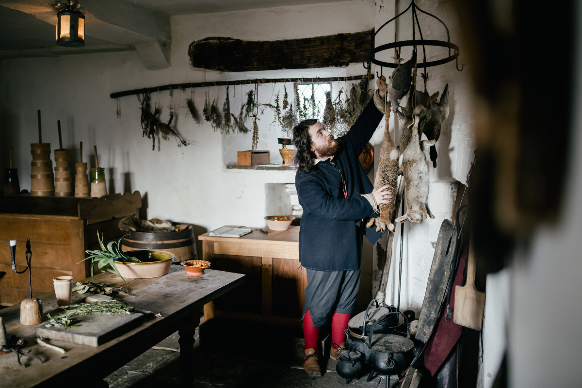 Historic Interpreter in small kitchen- Gamekeeper 02